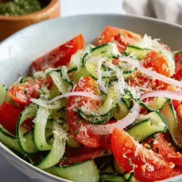 Zesty Italian Cucumber Salad Recipe with Tomatoes and Parmesan